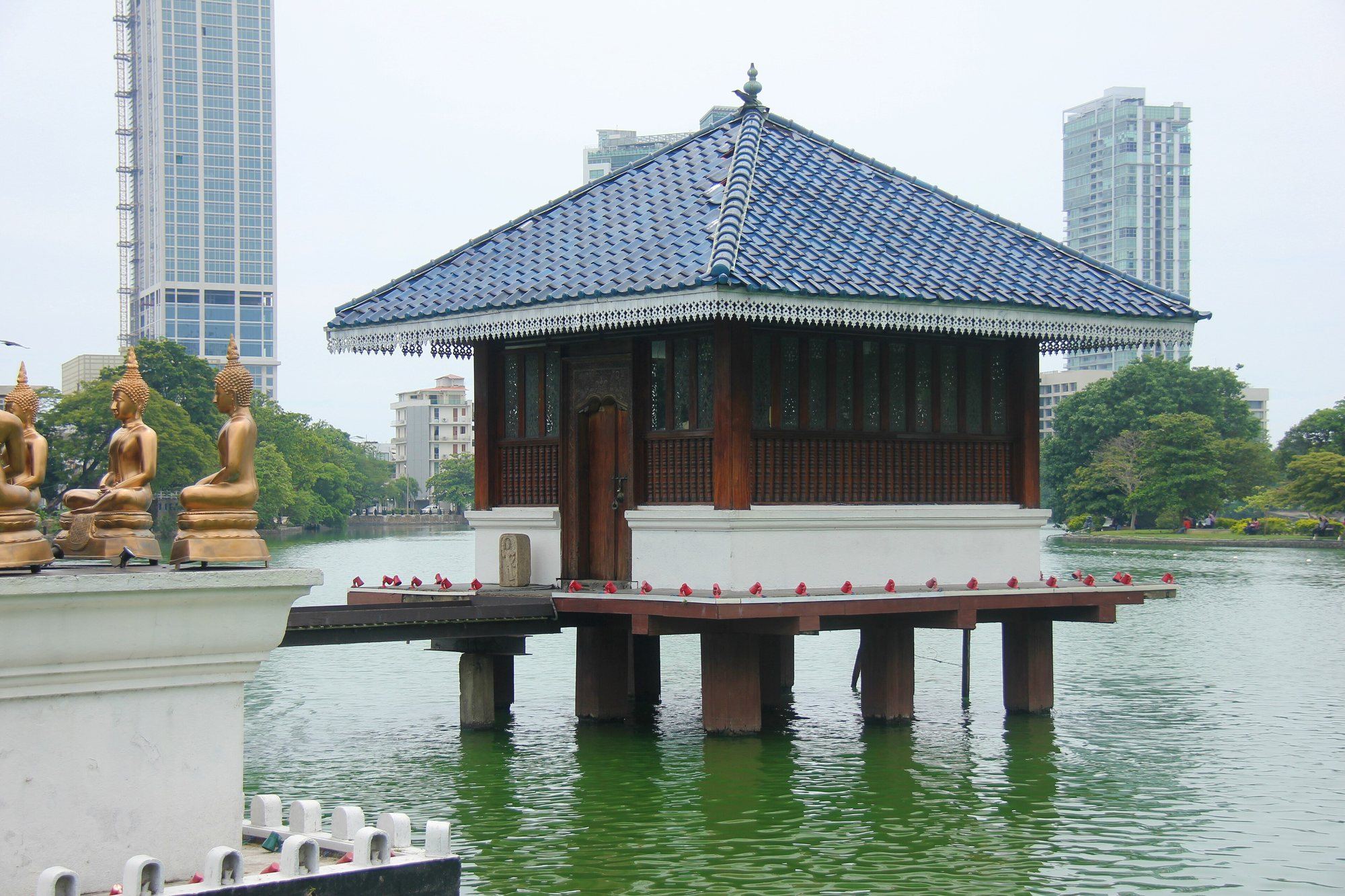 The Seema Malaka temple of Gangaramaya on Beira Lake, with Colombo towers behind