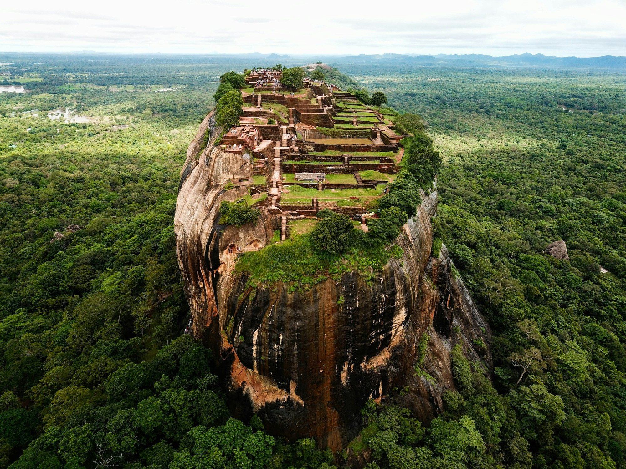 Aerial view of Sigiriya rock rising above the forest
